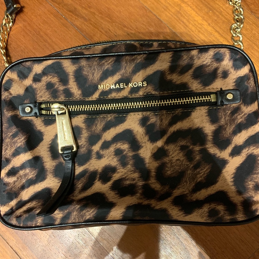 MK cheetah cross body